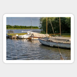 Boats moored on Hickling Broad in the Norfolk Broads National Park Sticker